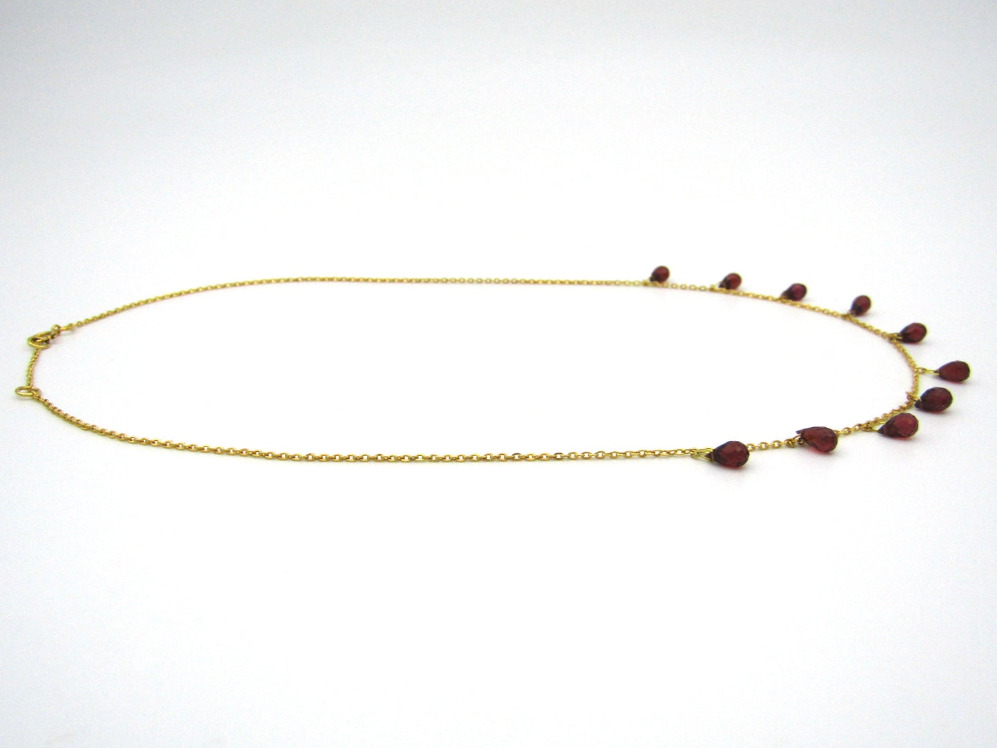 18K gold garnet necklace.