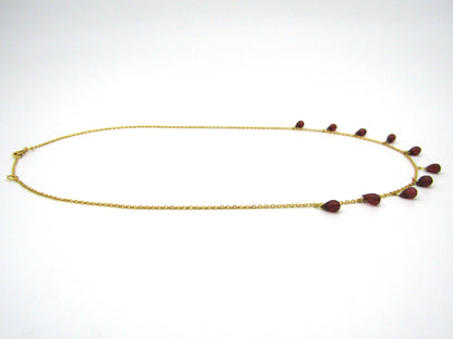 18K gold garnet necklace.