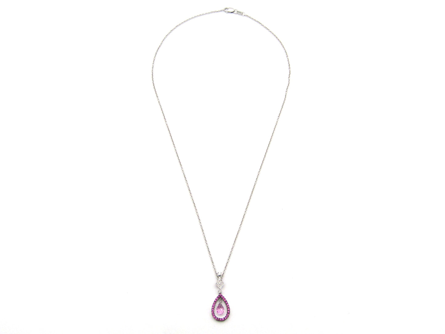 18K gold pink sapphire and diamond pendant.