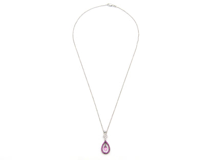 18K gold pink sapphire and diamond pendant.