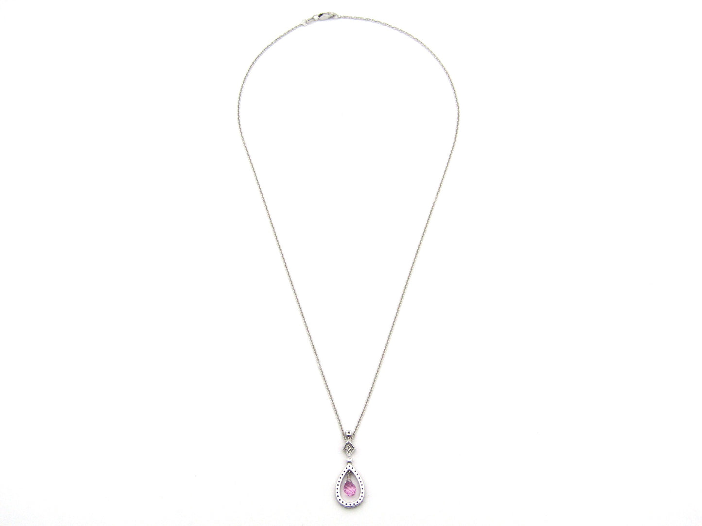 18K gold pink sapphire and diamond pendant.