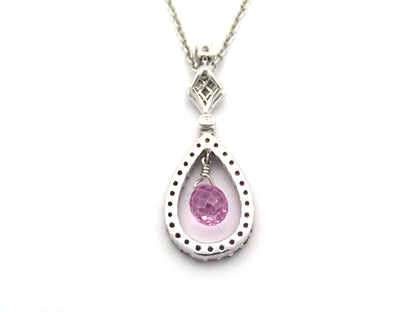 18K gold pink sapphire and diamond pendant.