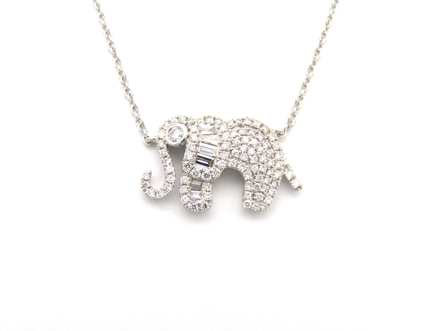 18K gold diamond elephant necklace.