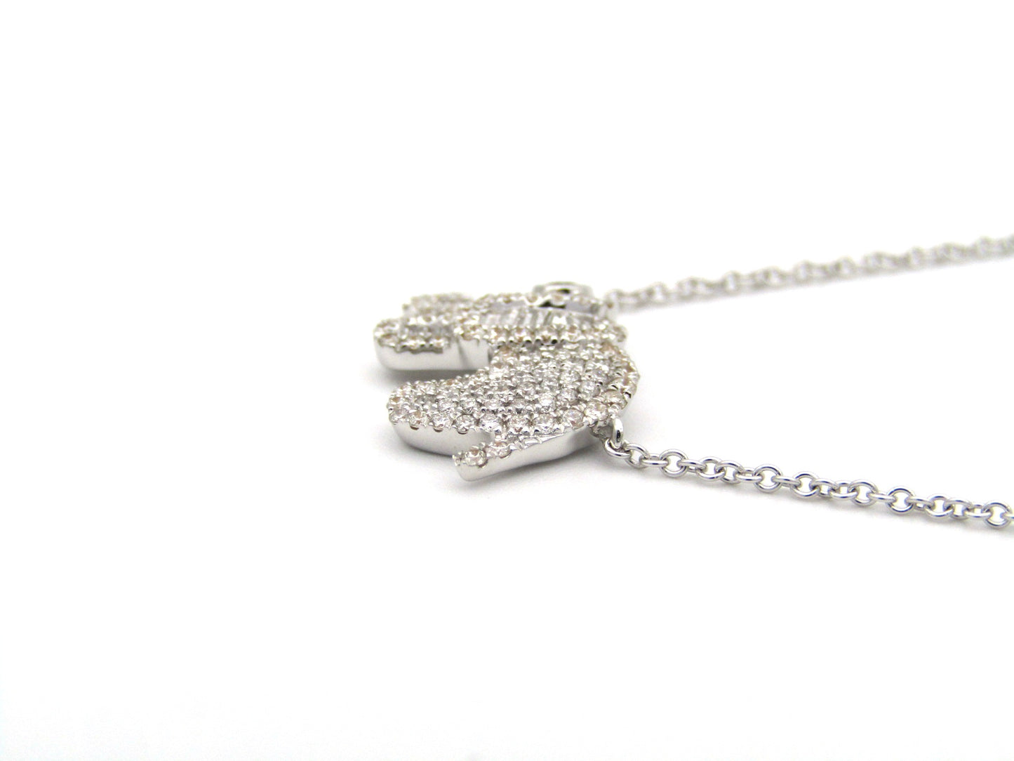 18K gold diamond elephant necklace.