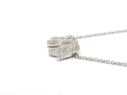 18K gold diamond elephant necklace.
