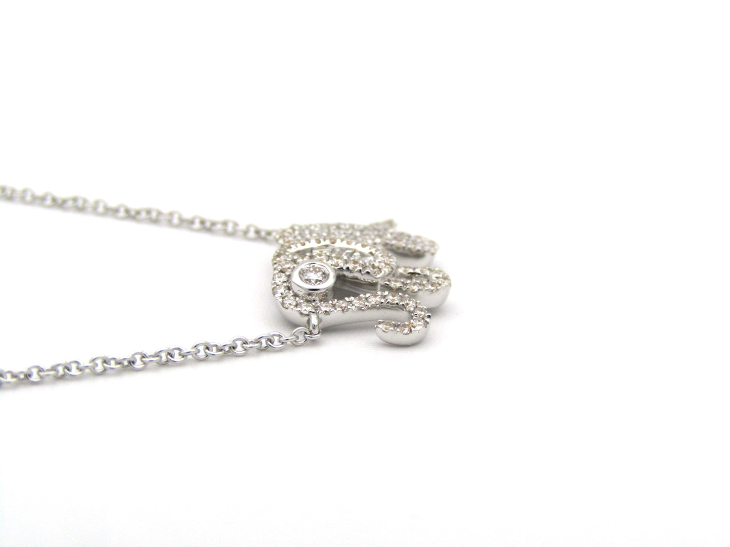 18K gold diamond elephant necklace.