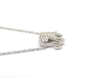 18K gold diamond elephant necklace.