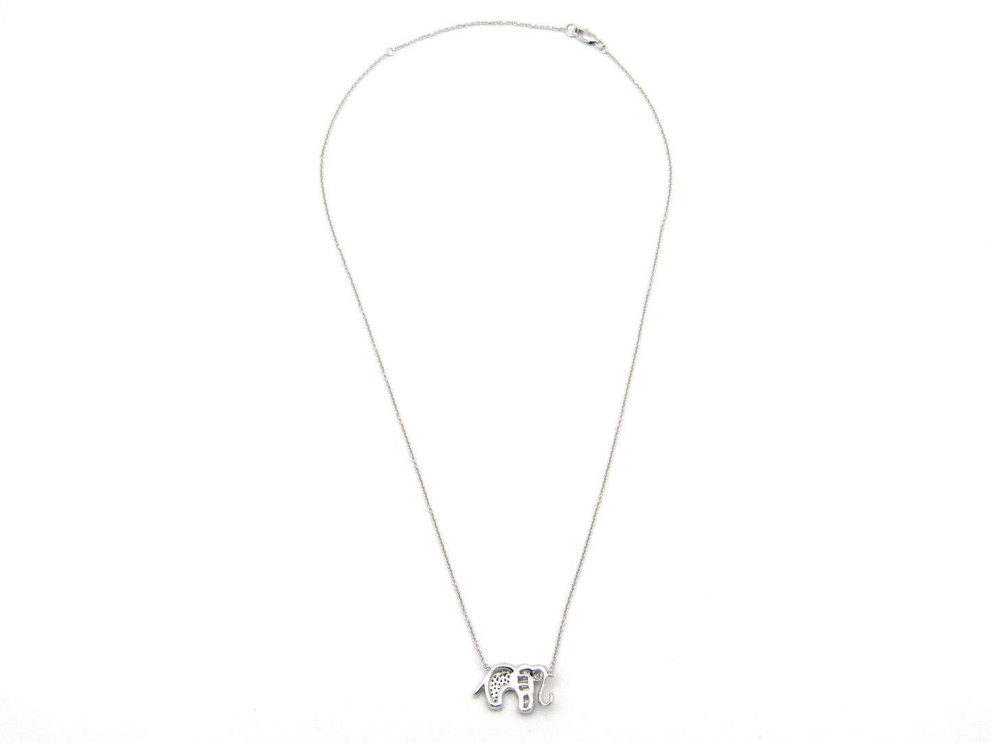 18K gold diamond elephant necklace.