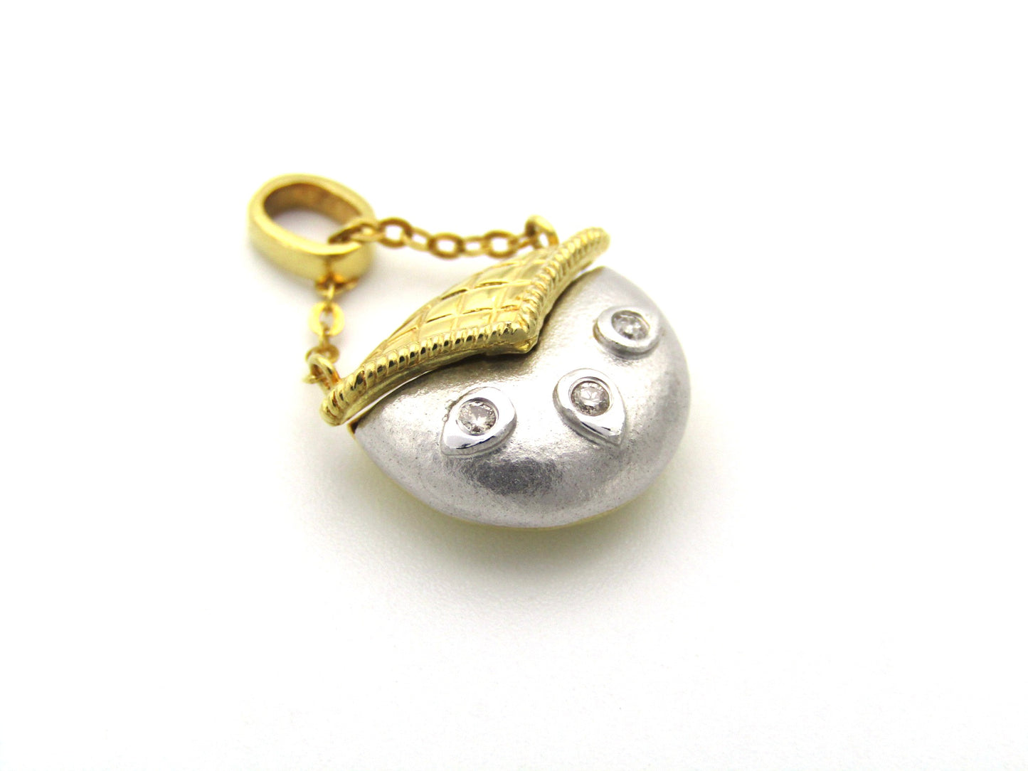 18K gold diamond handbag pendant.
