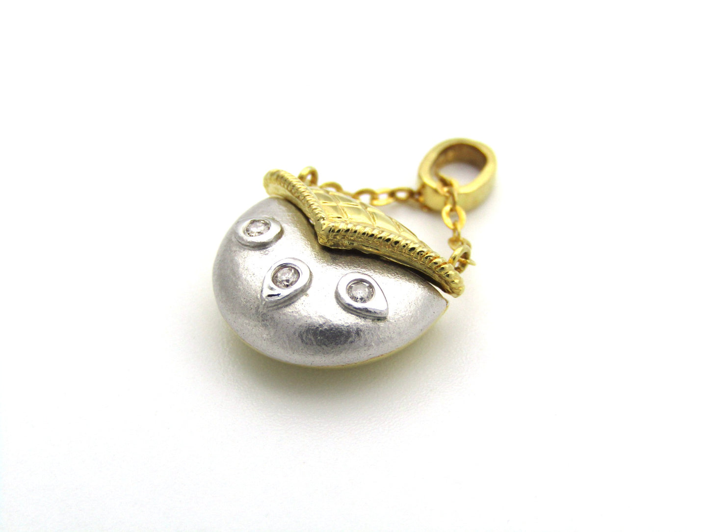 18K gold diamond handbag pendant.