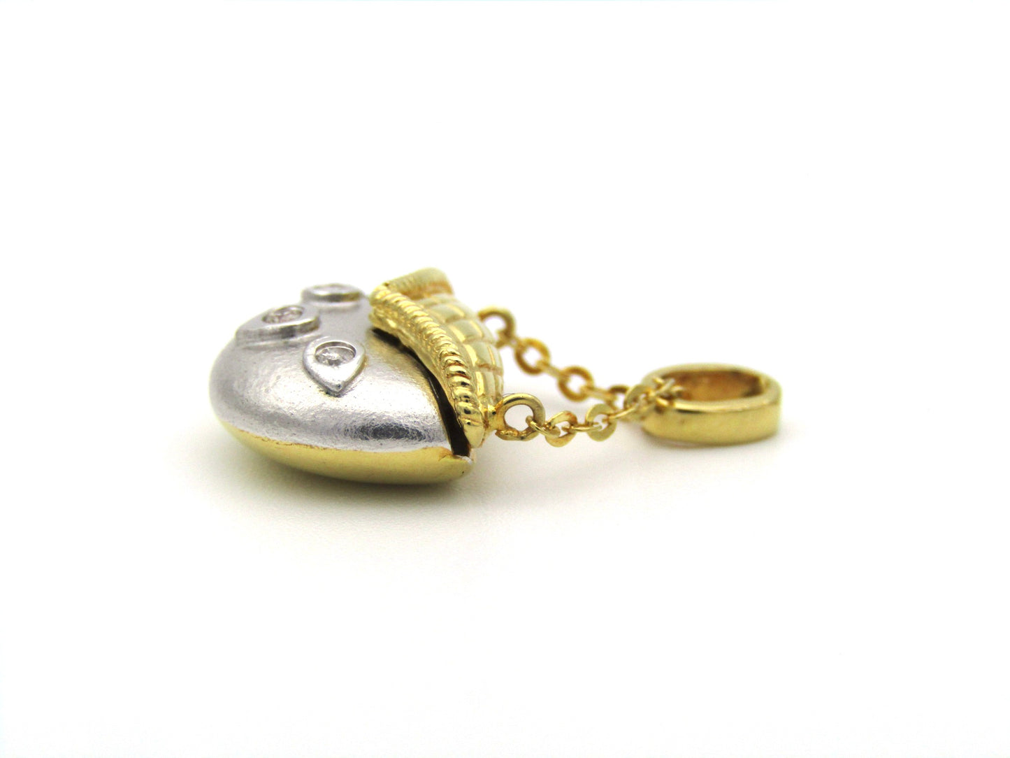 18K gold diamond handbag pendant.