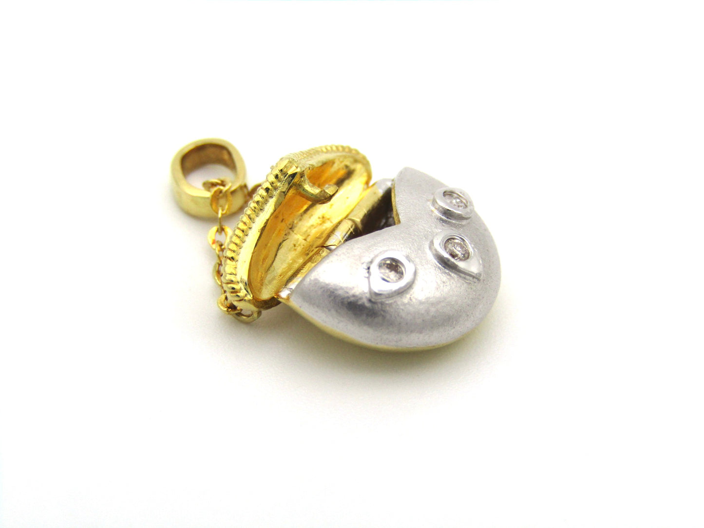 18K gold diamond handbag pendant.