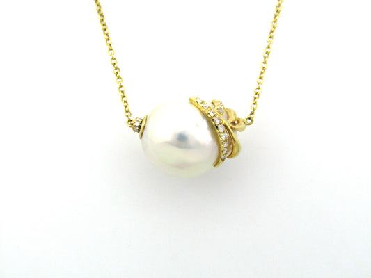 14K gold baroque pearl and diamond floating necklace.