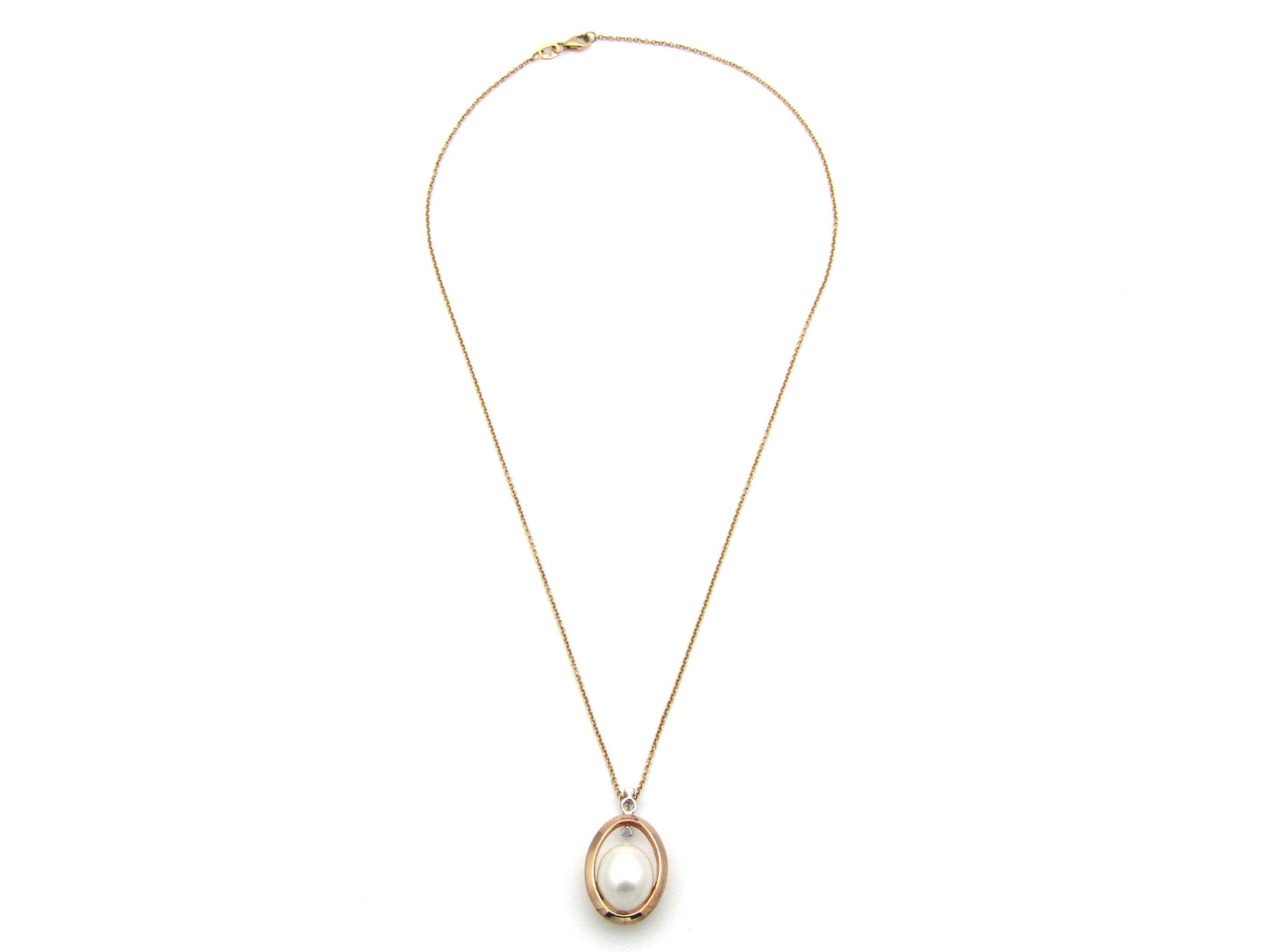18K tri-gold freshwater pearl pendant with 18K gold chain.