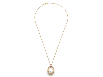 18K tri-gold freshwater pearl pendant with 18K gold chain.