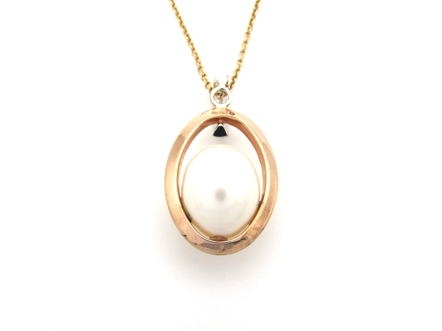18K tri-gold freshwater pearl pendant with 18K gold chain.