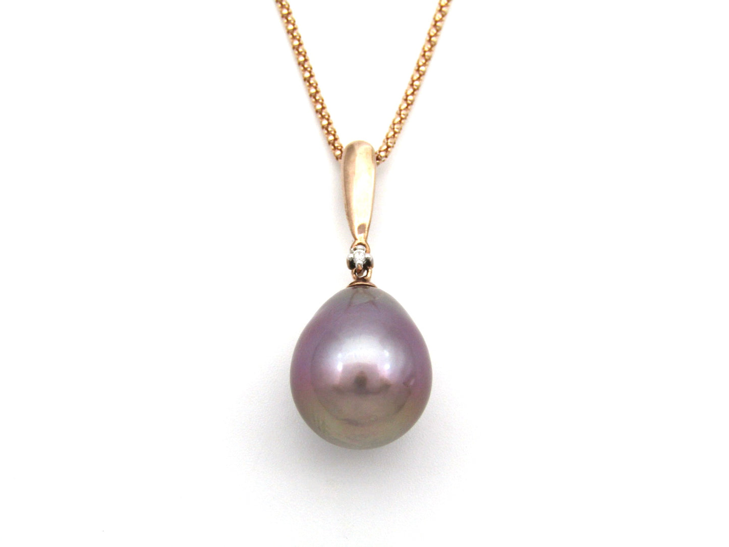9K gold freshwater pearl and diamond pendant with 18K gold chain.