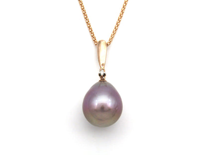 9K gold freshwater pearl and diamond pendant with 18K gold chain.