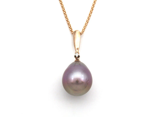 9K gold freshwater pearl and diamond pendant with 18K gold chain.