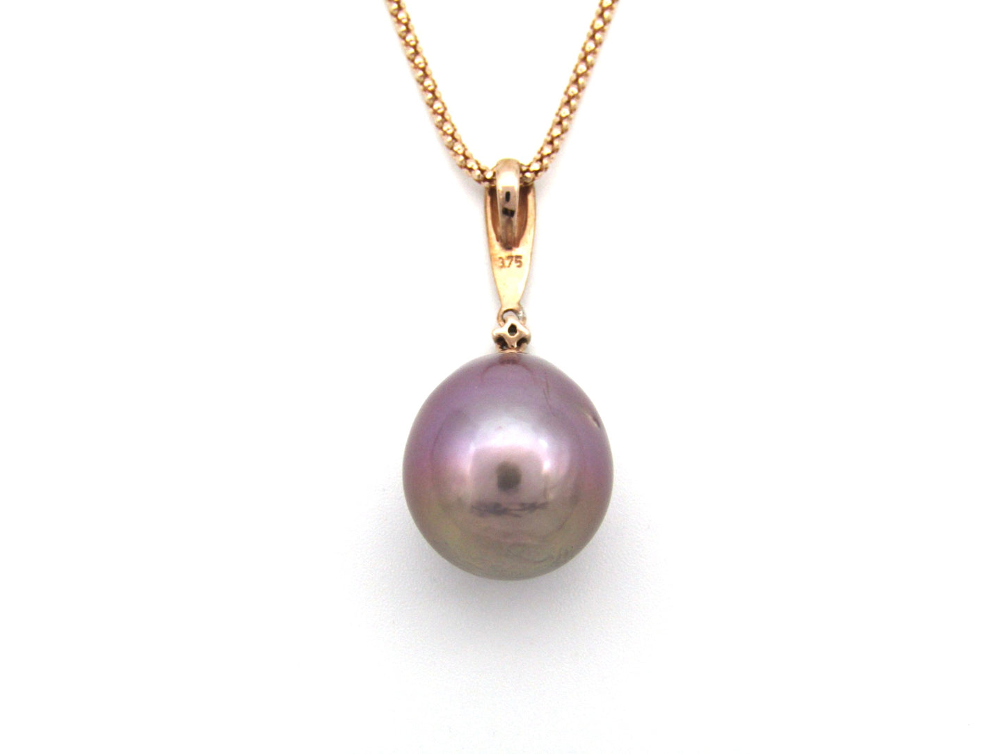 9K gold freshwater pearl and diamond pendant with 18K gold chain.
