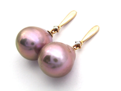9K gold freshwater pearl and diamond dangle earrings.