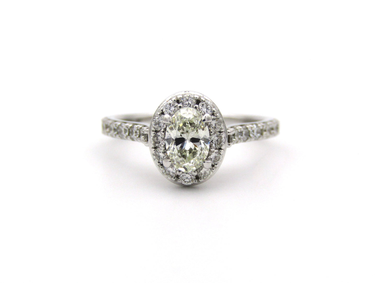Platinum and 18K gold Angel Halo diamond ring by Browns.