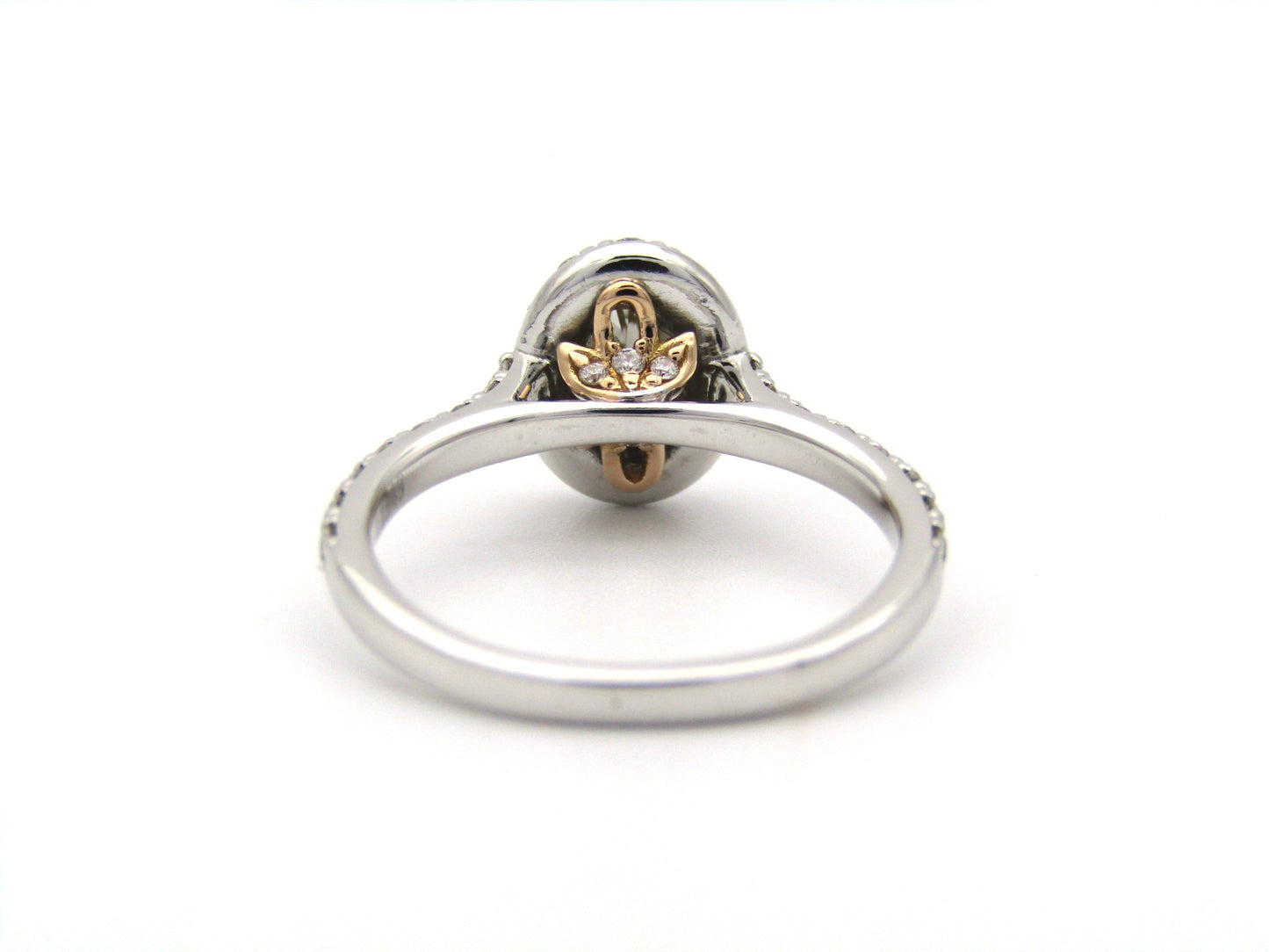 Platinum and 18K gold Angel Halo diamond ring by Browns.