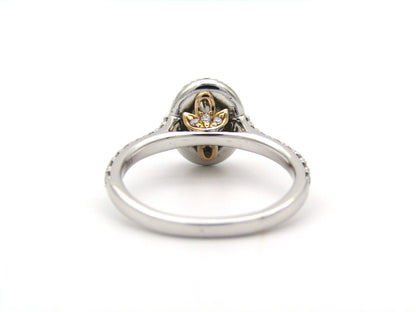 Platinum and 18K gold Angel Halo diamond ring by Browns.
