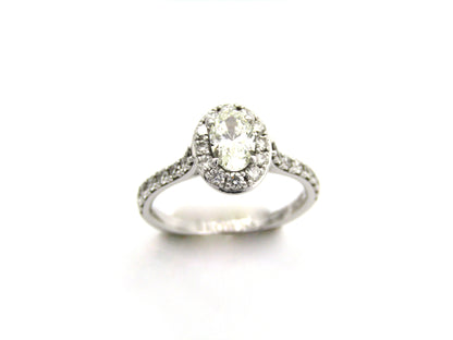Platinum and 18K gold Angel Halo diamond ring by Browns.