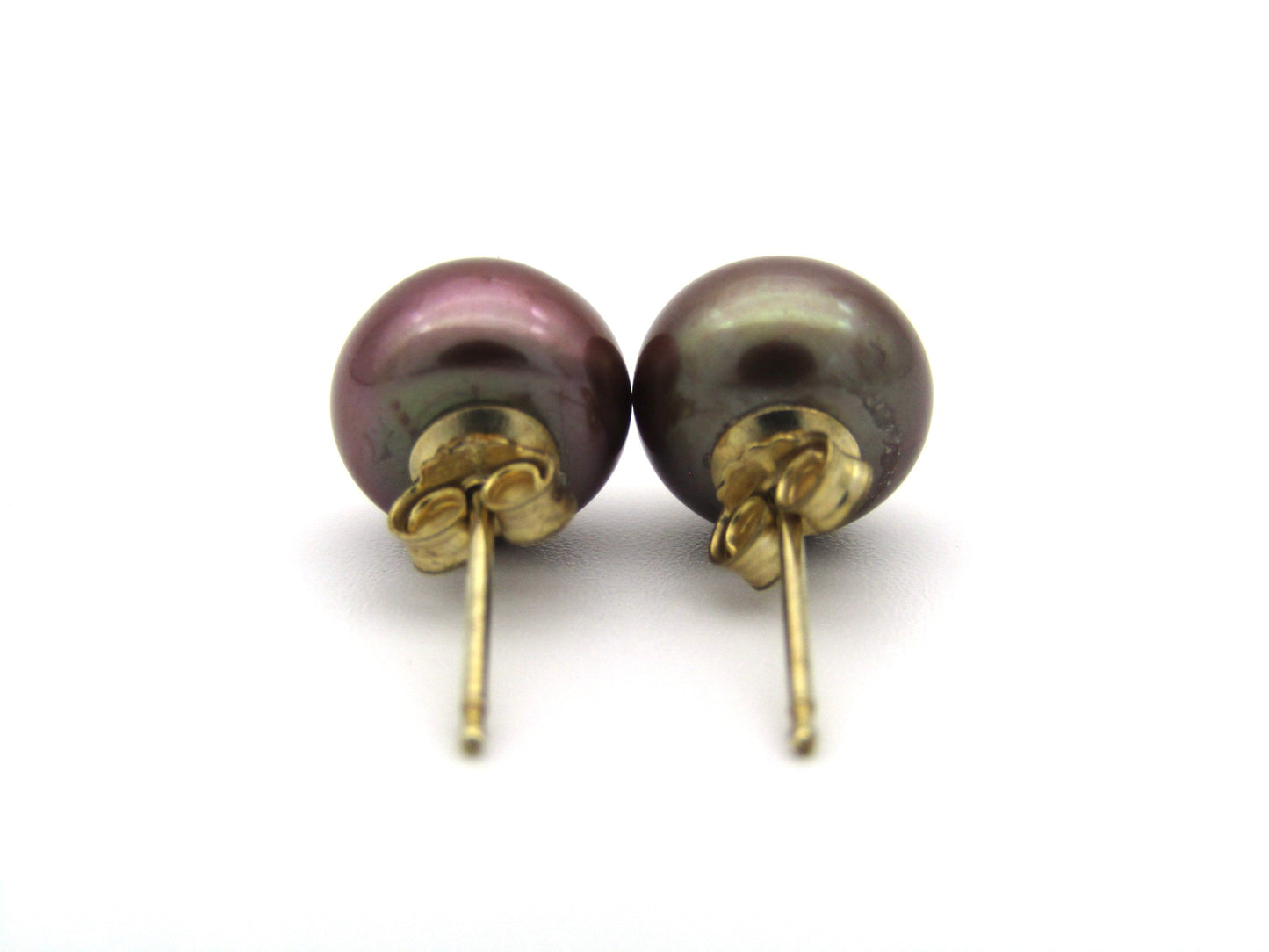 9K gold freshwater pearl stud earrings.