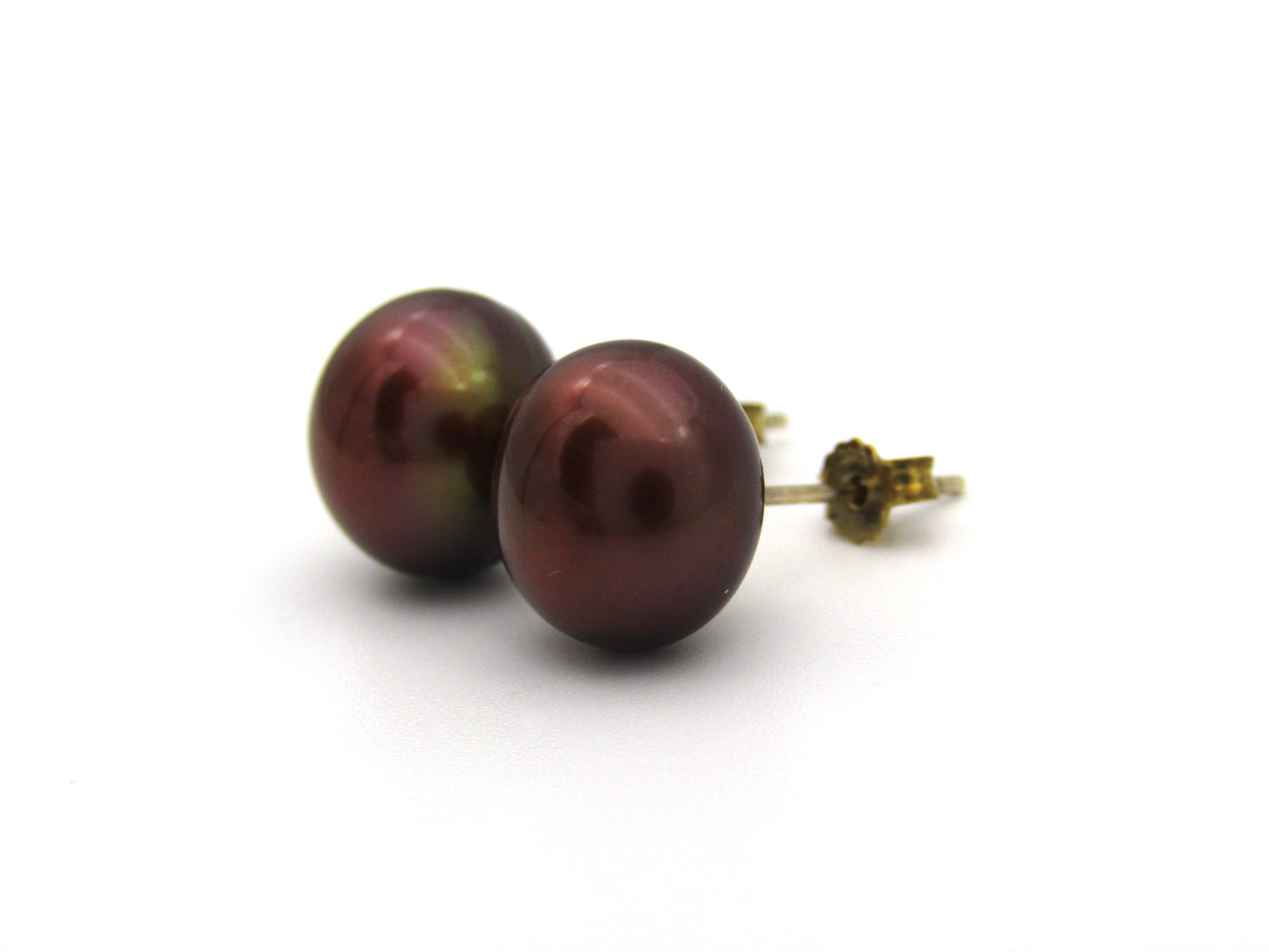 9K gold freshwater pearl stud earrings.