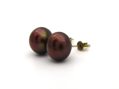 9K gold freshwater pearl stud earrings.