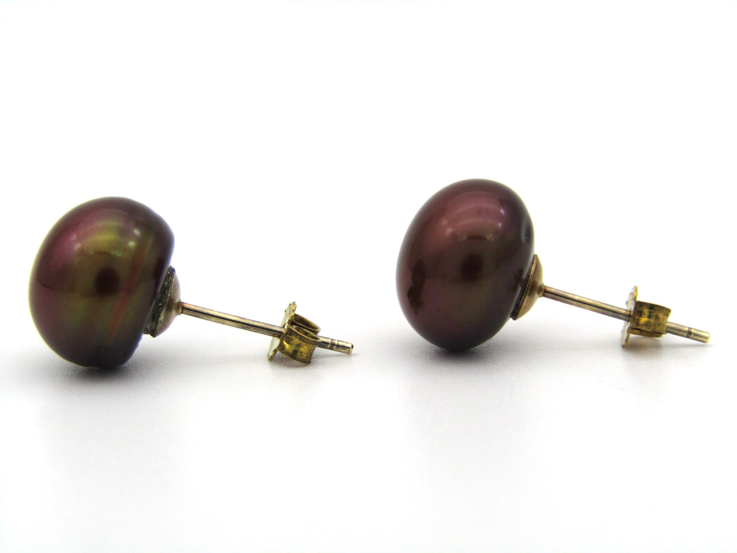 9K gold freshwater pearl stud earrings.
