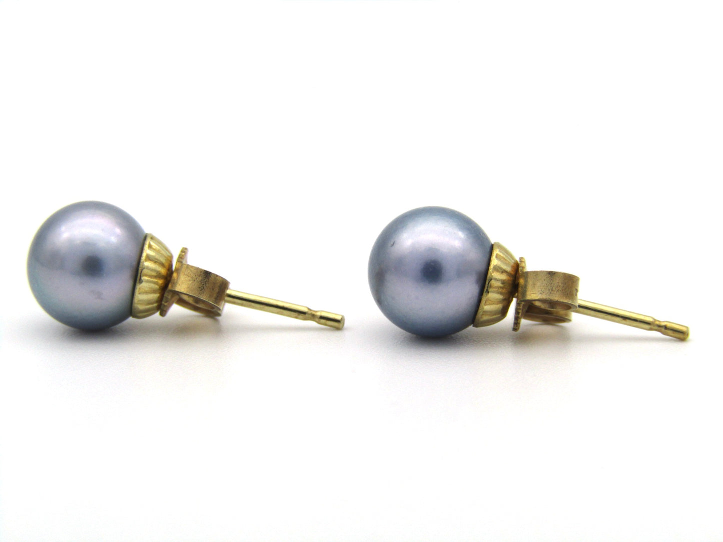 9K gold Akoya pearl stud earrings.