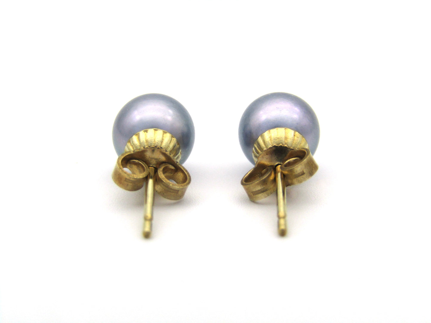 9K gold Akoya pearl stud earrings.