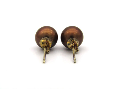 9K gold Akoya pearl stud earrings.