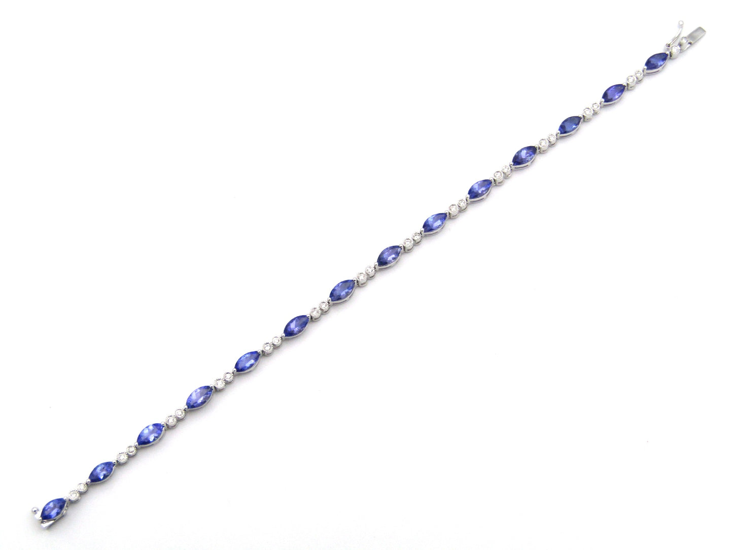 18K gold tanzanite and diamond bracelet by Browns.