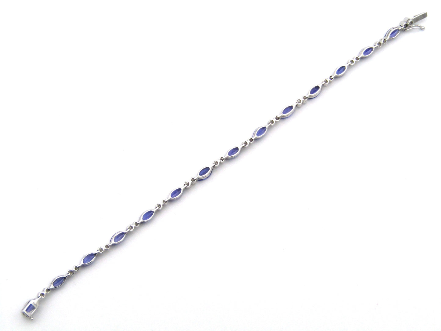 18K gold tanzanite and diamond bracelet by Browns.
