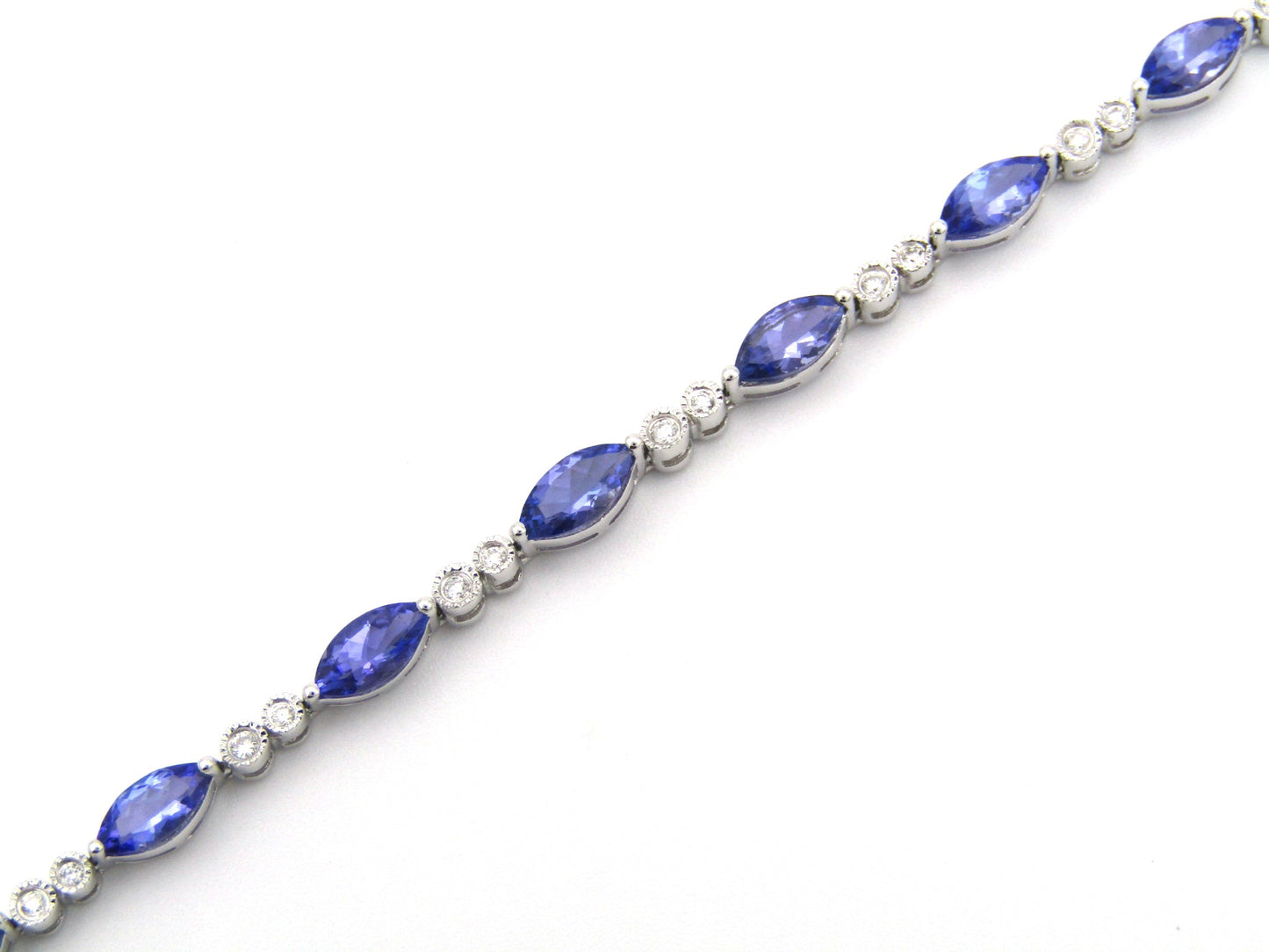 18K gold tanzanite and diamond bracelet by Browns.