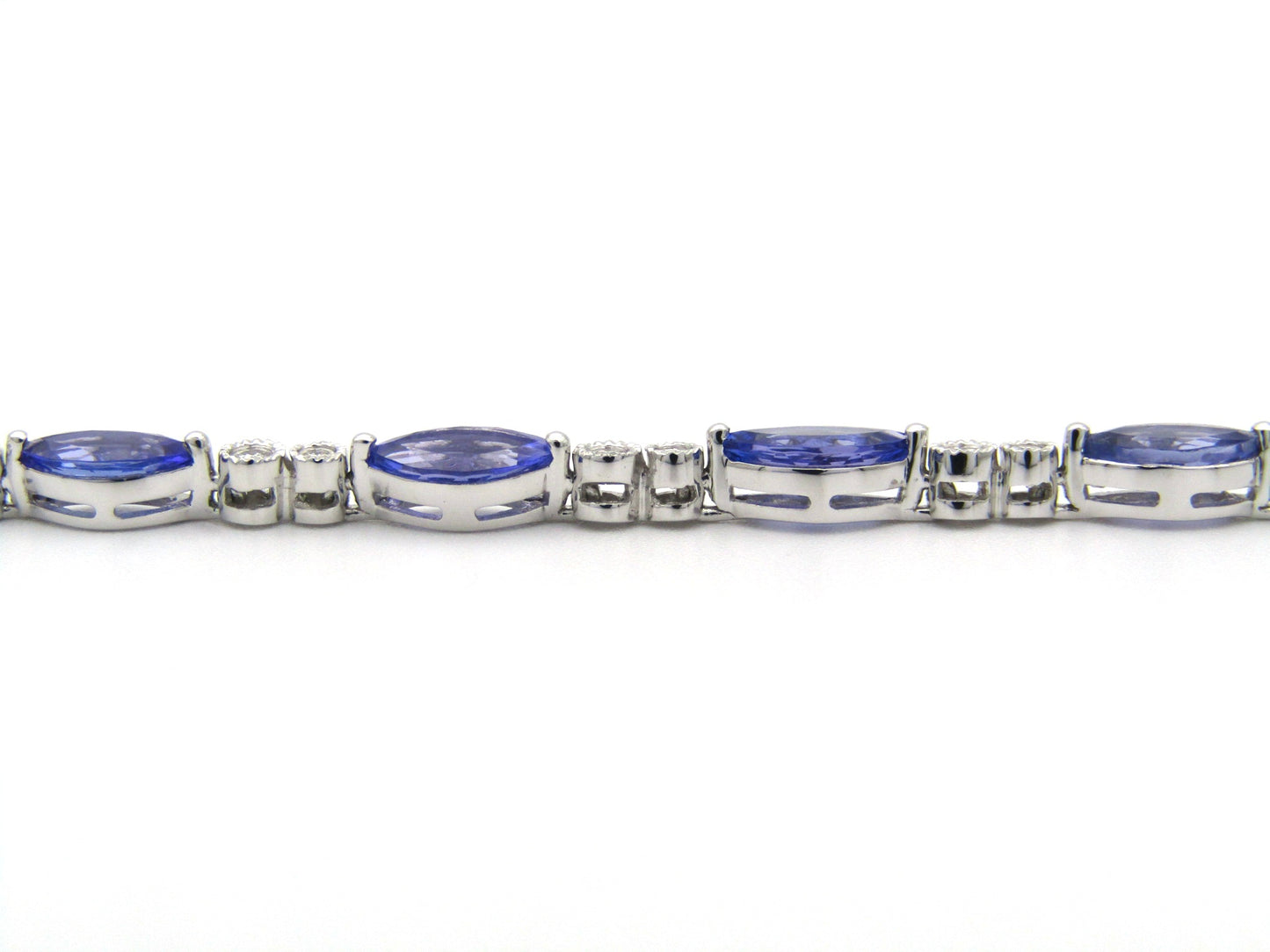 18K gold tanzanite and diamond bracelet by Browns.