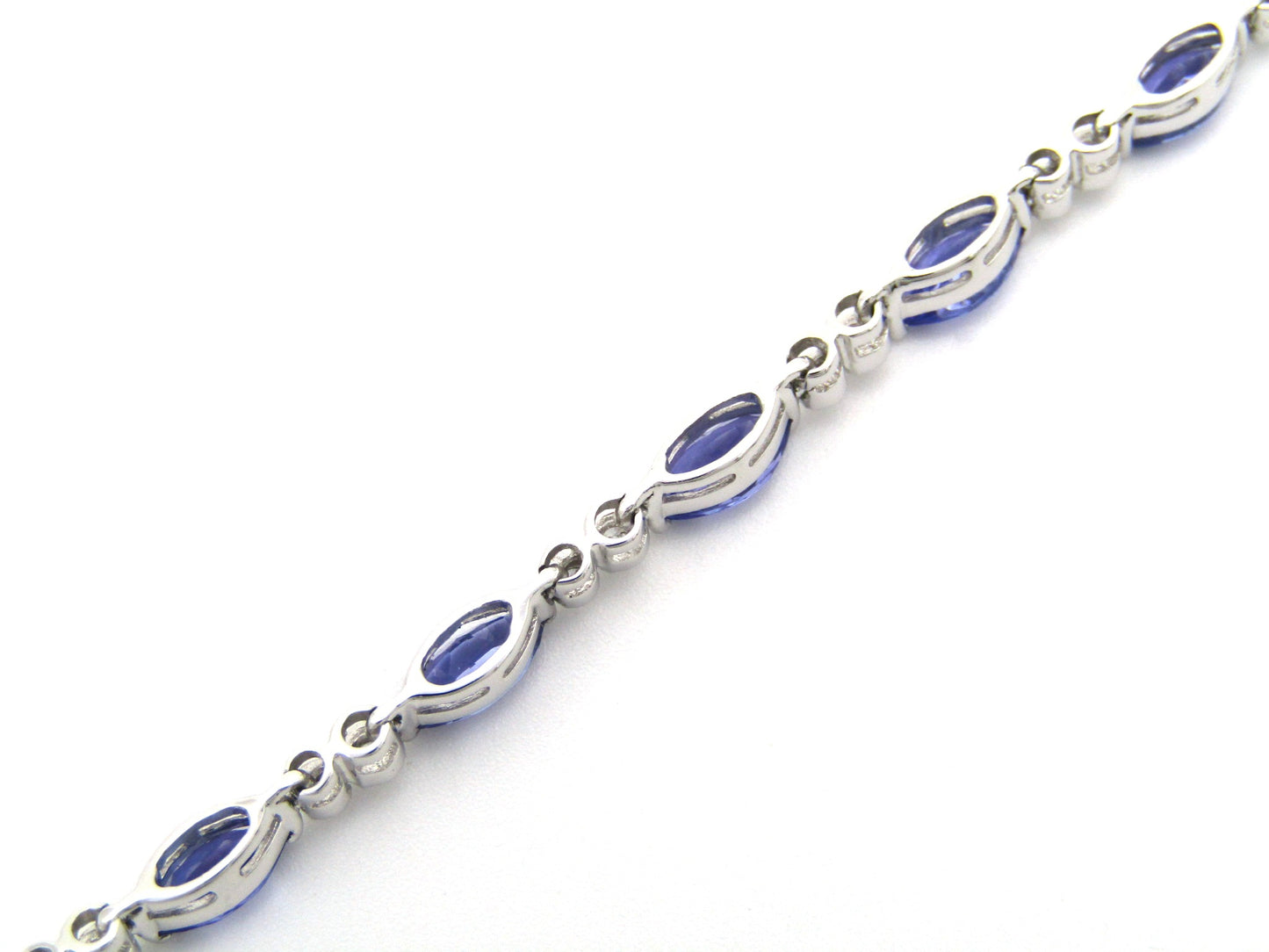 18K gold tanzanite and diamond bracelet by Browns.
