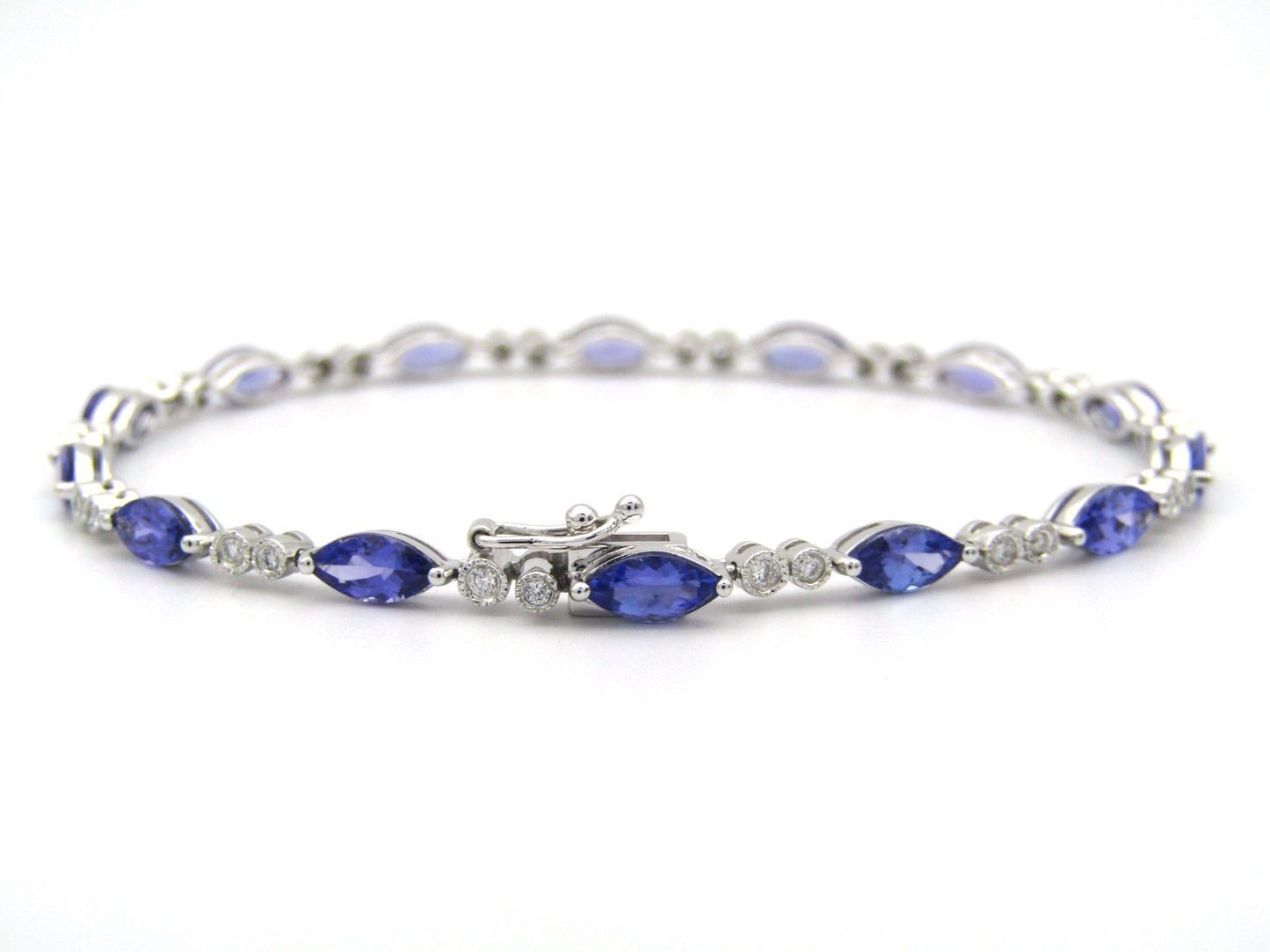 18K gold tanzanite and diamond bracelet by Browns.
