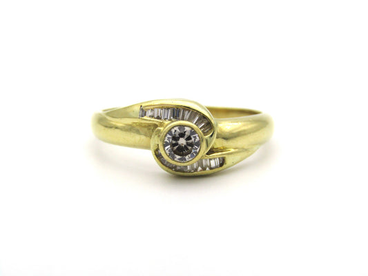 18K gold diamond ring, circa 1970's.