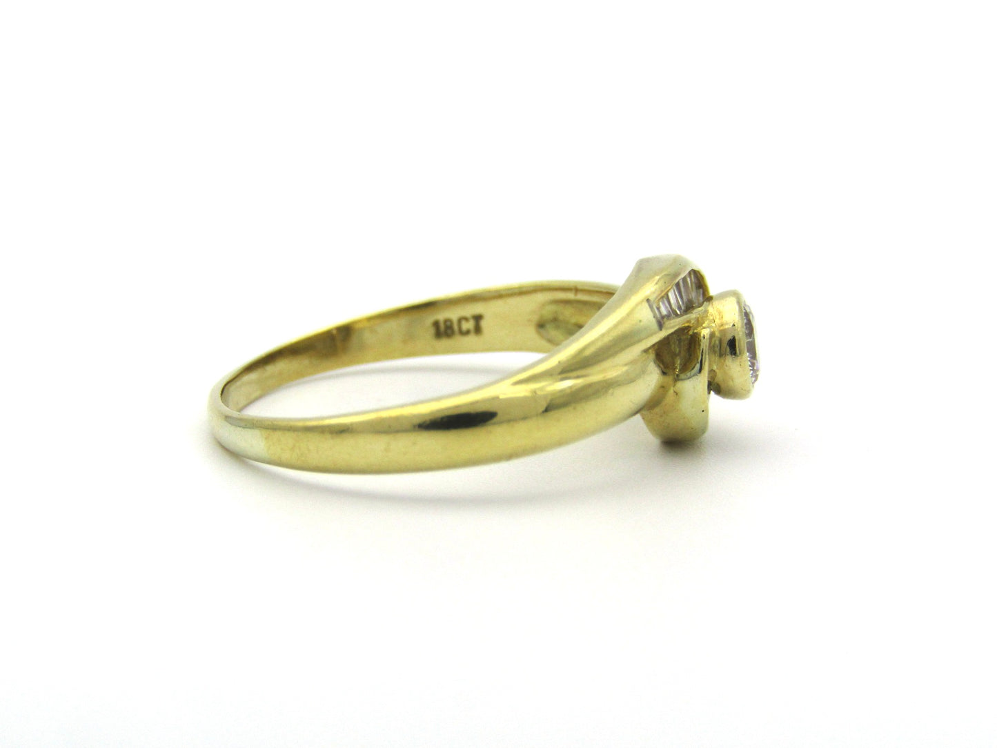 18K gold diamond ring, circa 1970's.