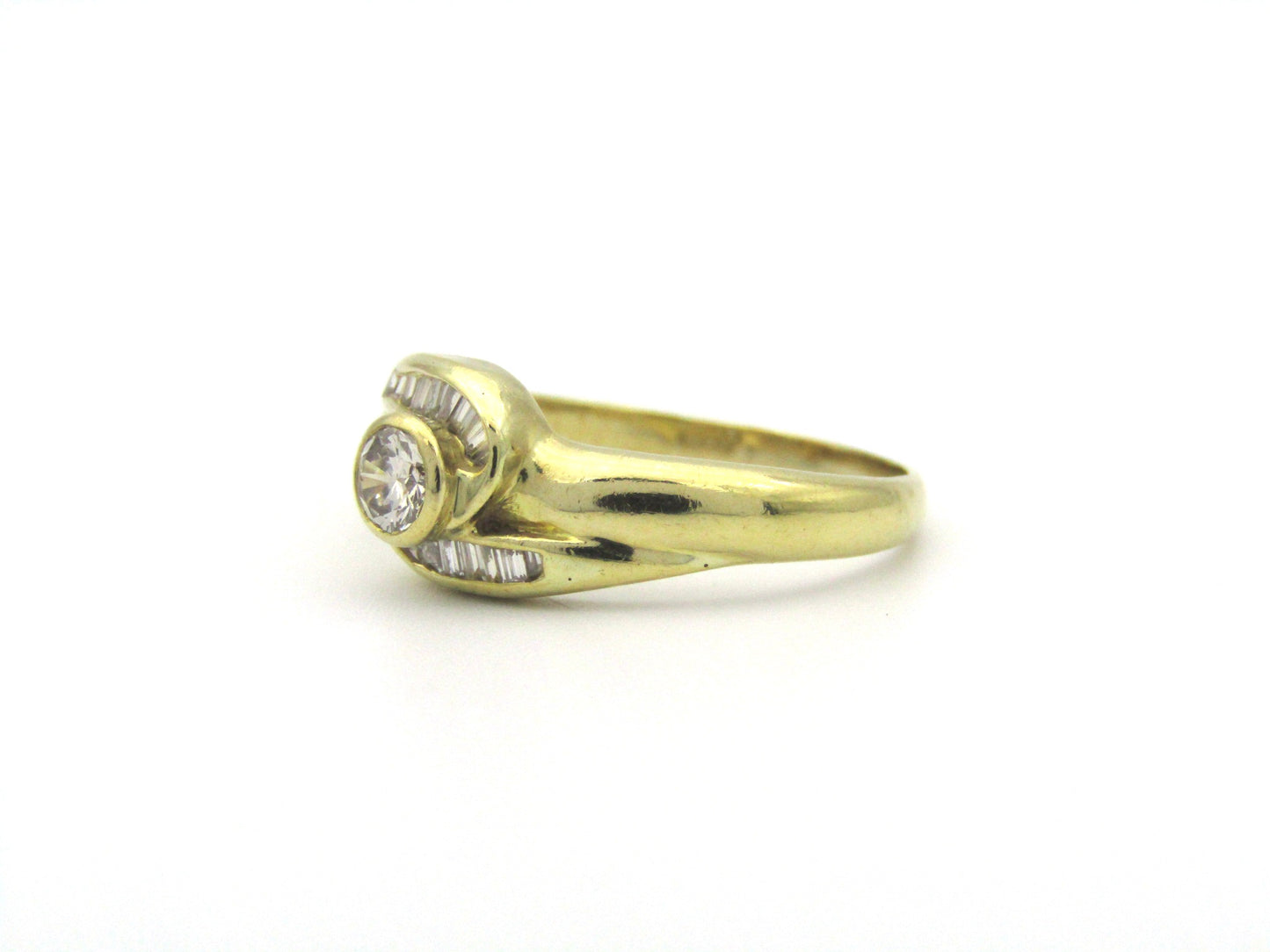 18K gold diamond ring, circa 1970's.