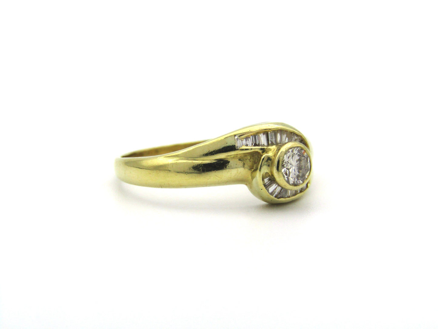 18K gold diamond ring, circa 1970's.