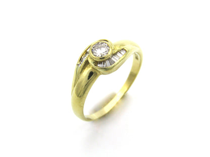 18K gold diamond ring, circa 1970's.