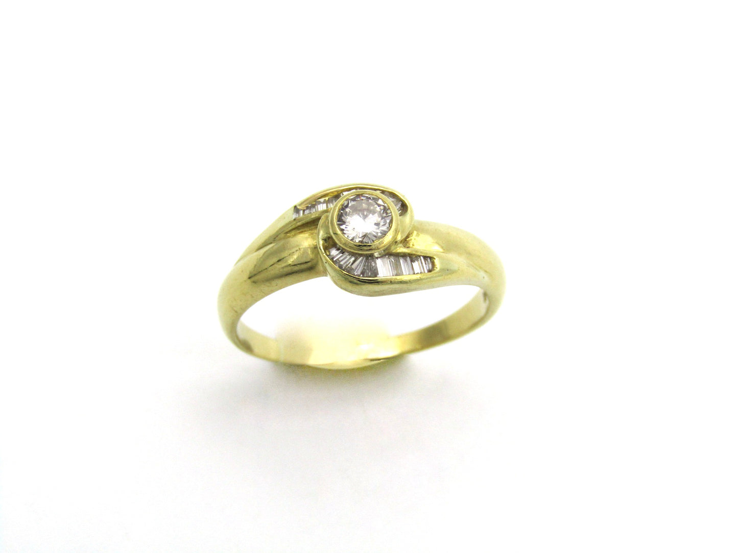 18K gold diamond ring, circa 1970's.