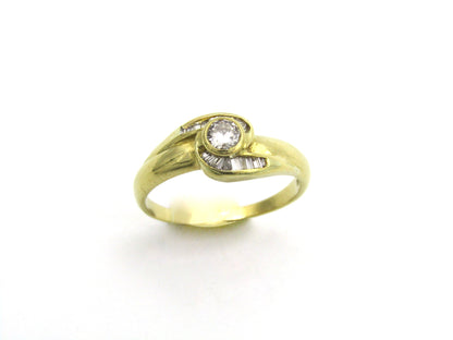 18K gold diamond ring, circa 1970's.