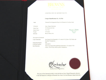 Platinum and 18K gold Angel Halo diamond ring by Browns.